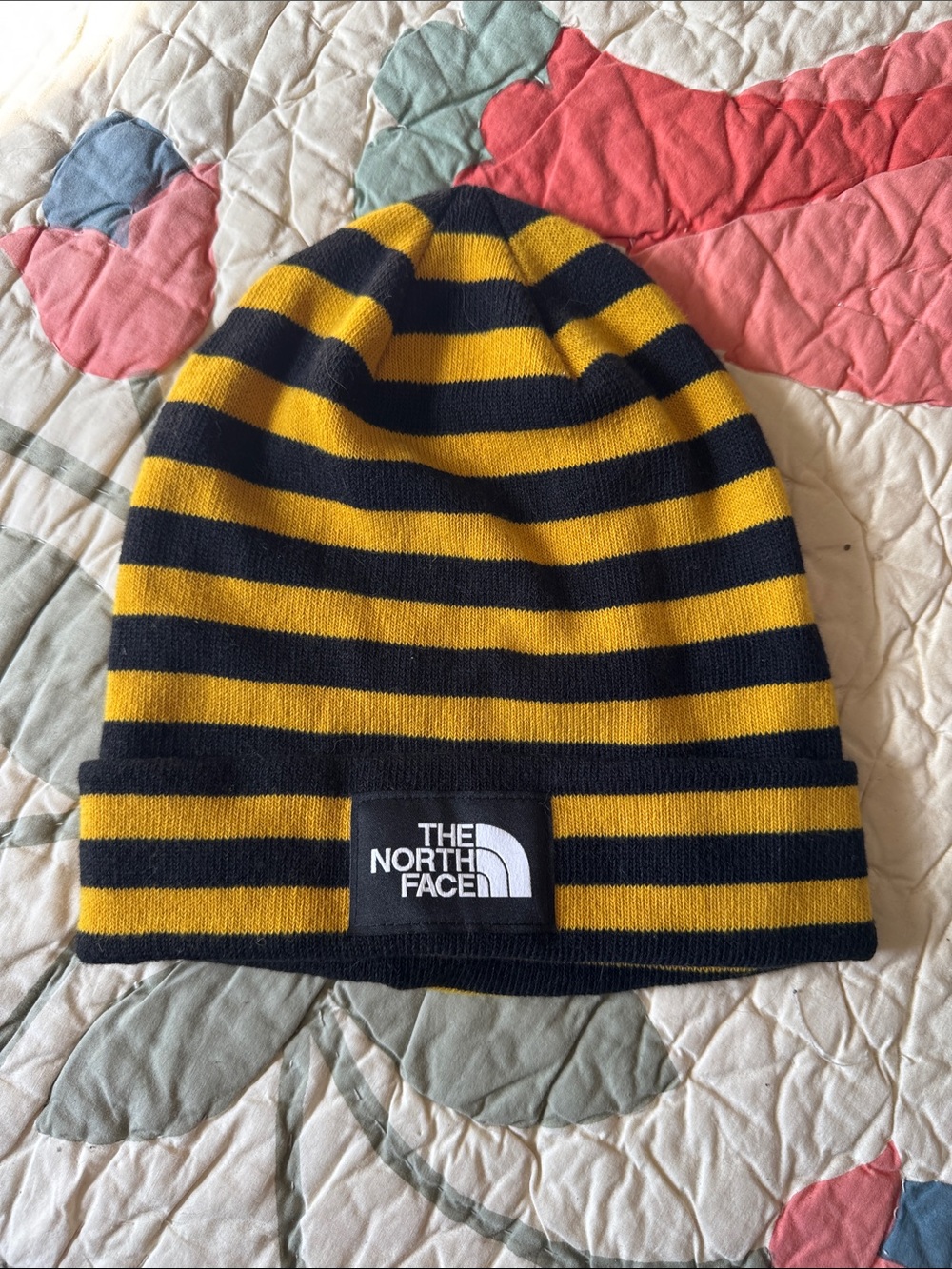 North Face striped beanie gold yellow black